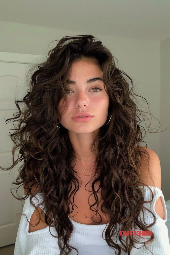 12 Haircuts for Thick Hair From Bold to Subtle Long Curly Hair Inspo